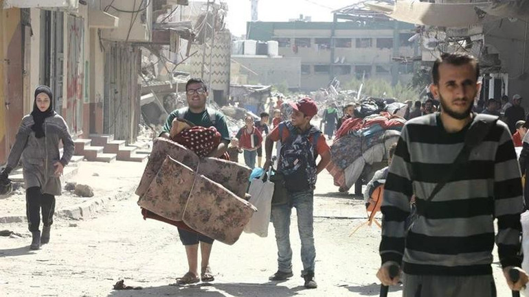 Người dân sơ tán tránh xung đột tại Jabalia, Dải Gaza. (Ảnh: THX/TTXVN) trung-dong-5170-3395.jpg