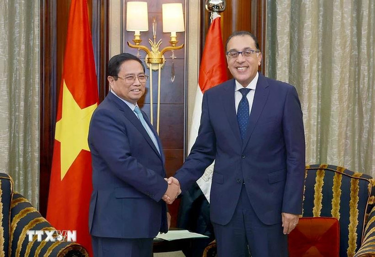 Thủ tướng Phạm Minh Chính gặp Thủ tướng Ai Cập Mostafa Madbouly. (Ảnh: Dương Giang/TTXVN). Thủ tướng Phạm Minh Chính gặp Thủ tướng Ai Cập Mostafa Madbouly. (Ảnh: Dương Giang/TTXVN).